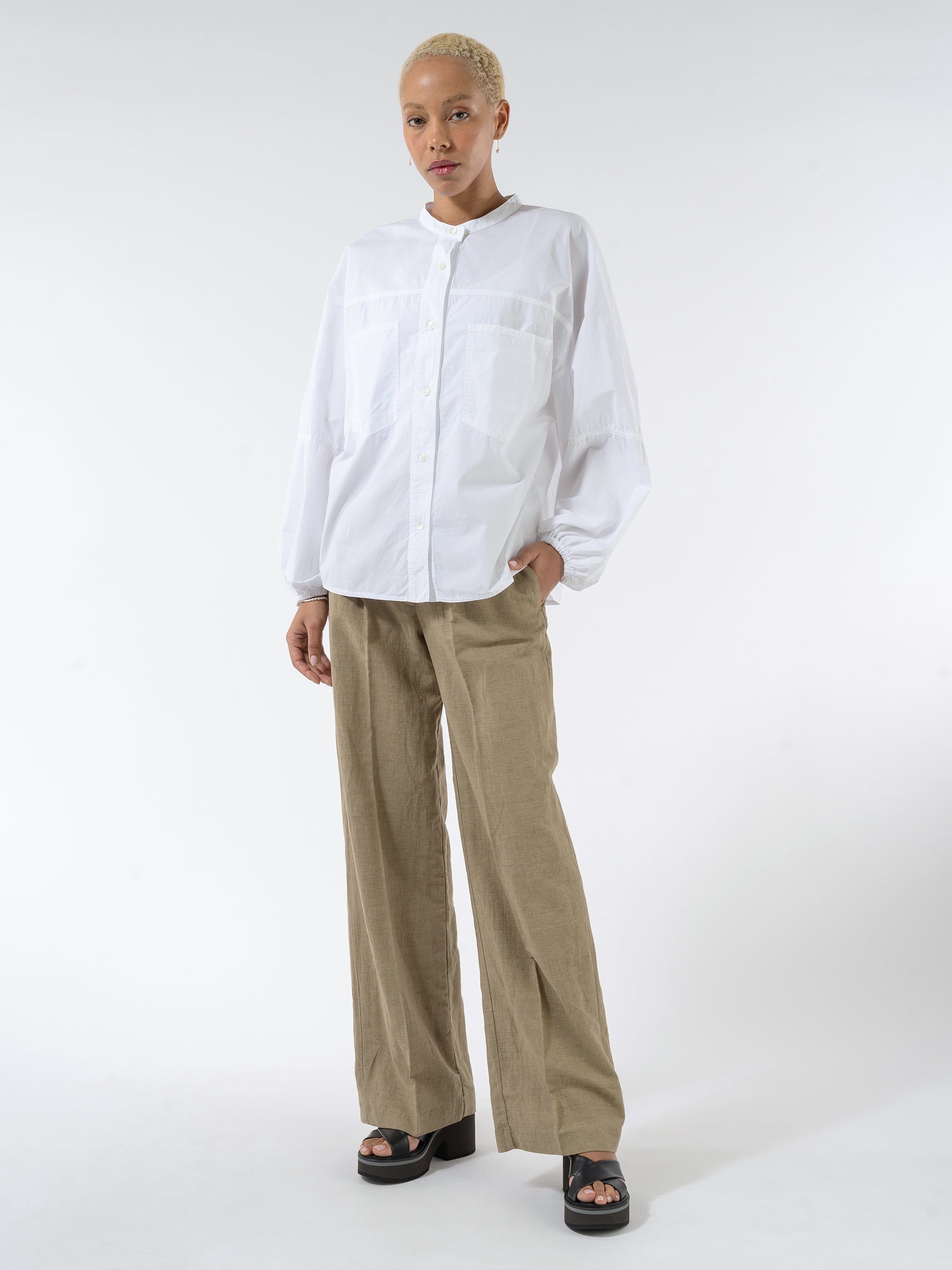 Trousers With Slightly Wide Legged-Cut And Pleats