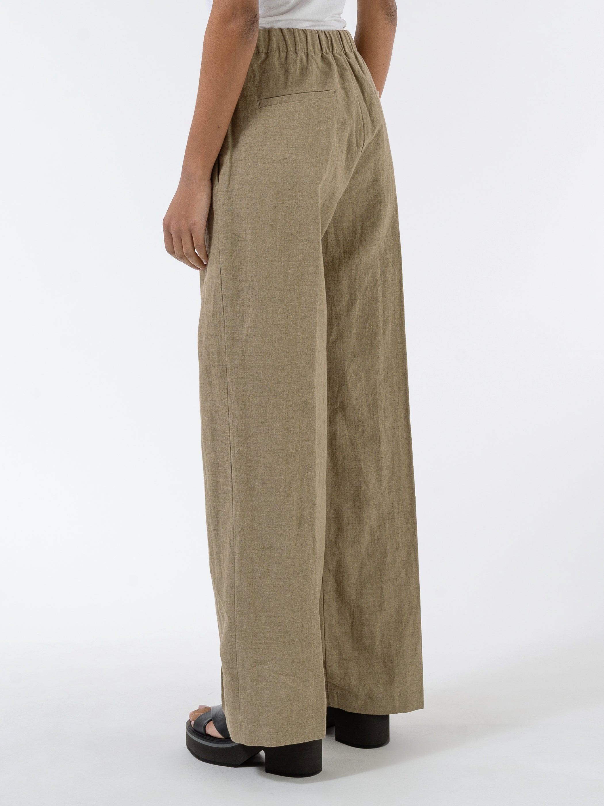 Trousers With Slightly Wide Legged-Cut And Pleats